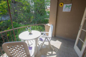 Sunny apartment with free private parking